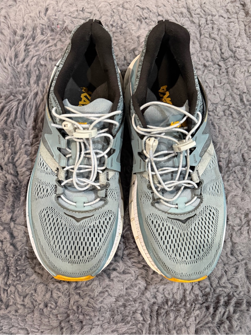 Hoka Light Blue Athletic Running Shoes with Yellow Accents